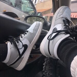 I’m selling my air jordan 1 mid smoke grey and black shoes. Fairly used.